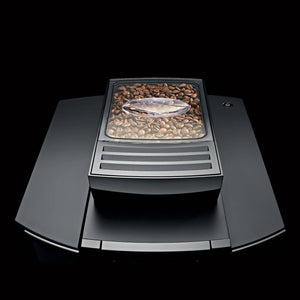 Compartimento de granos de café de la Jura WE6 con tapa transparente.