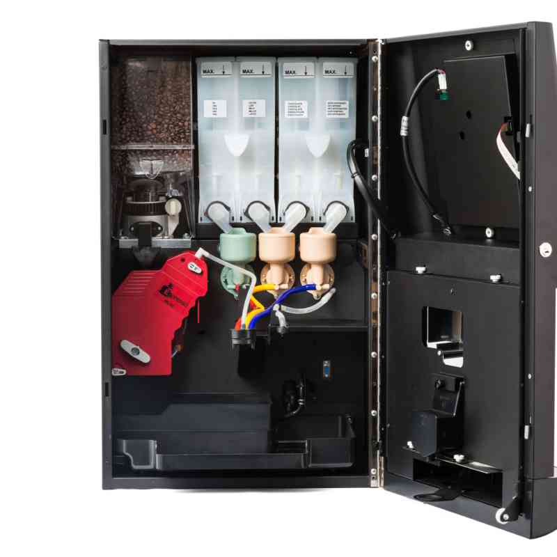 Vista interna de la cafetera Azkoyen Vitro S5 mostrando componentes y depósitos.